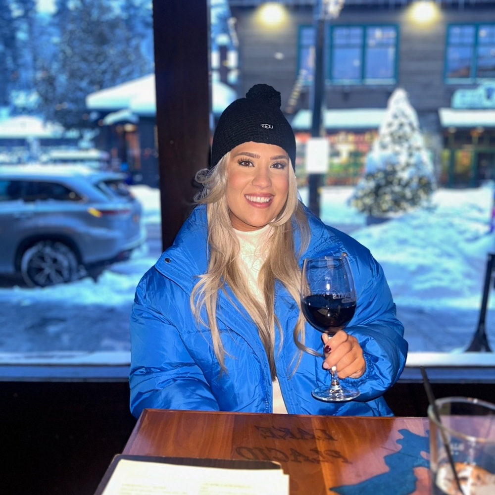 Blue Puffer Jacket with Black Beanie